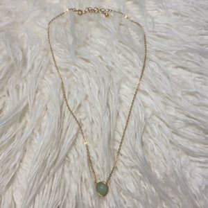 Faux gold necklace with green stone adjustable